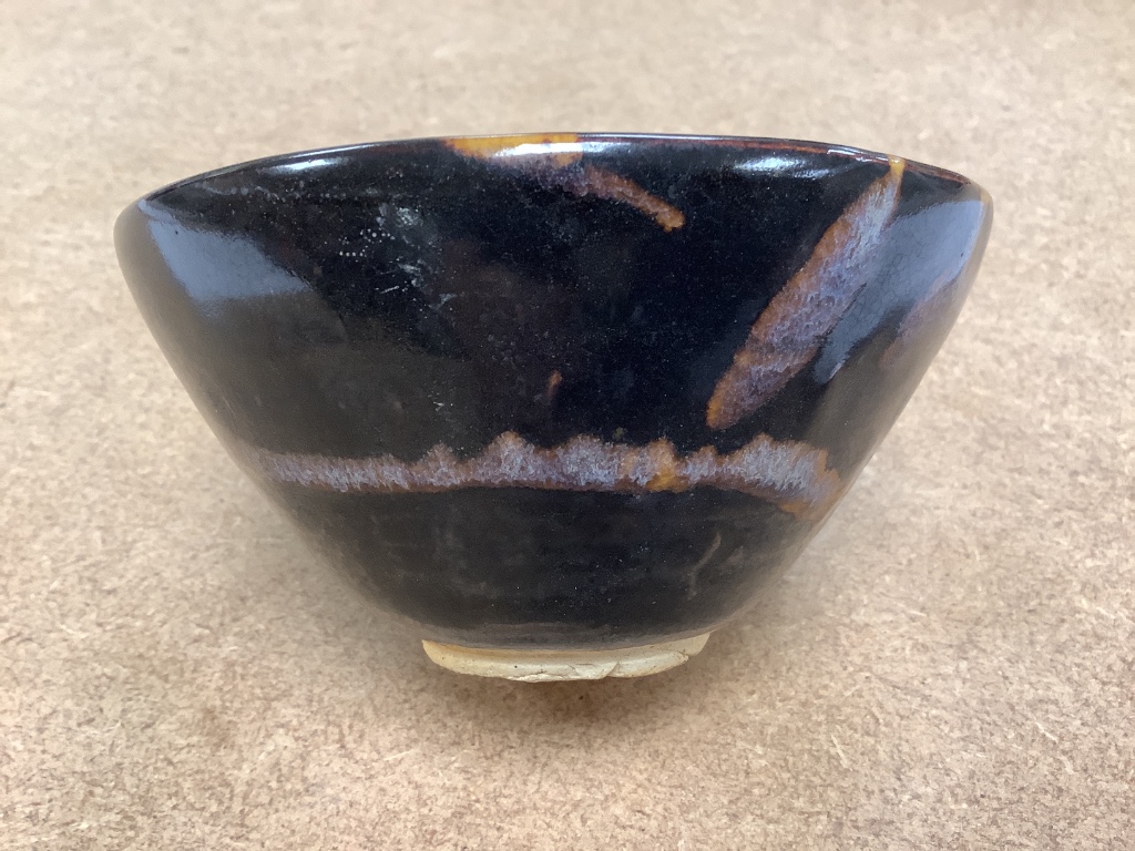 A Chinese blackware splashed bowl 11cm diam